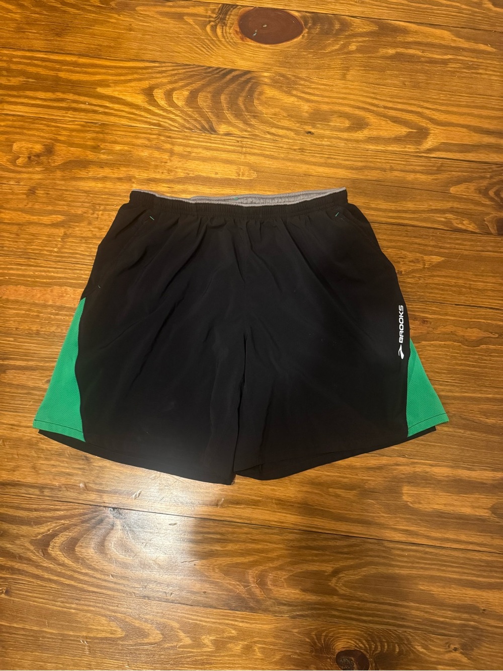 Brooks Men’s Black Shorts with Green Side Panels